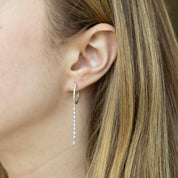 Argollas cascada diamantes Oro Blanco 14 Kilates